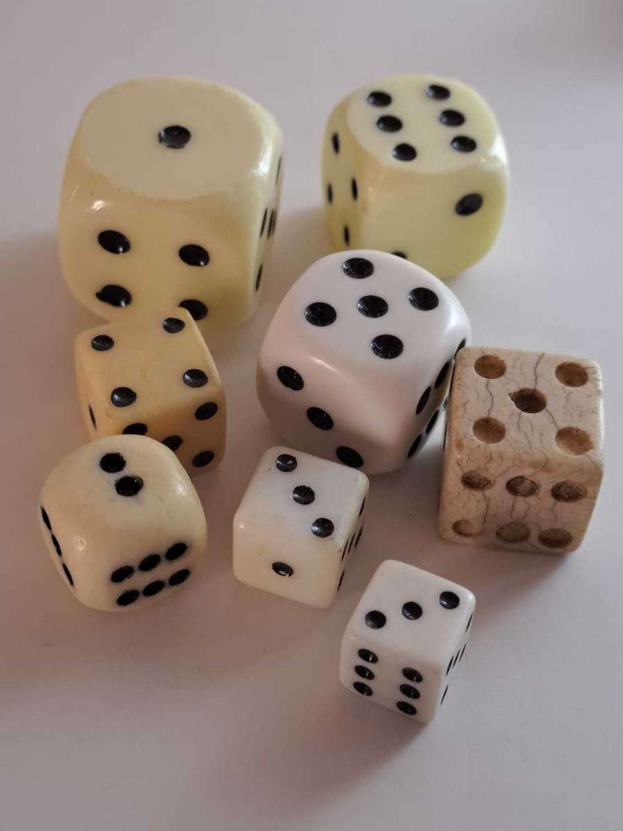 Dice collection of all colours and sizes. Some very unique pieces in wood, metal, and ceramic.