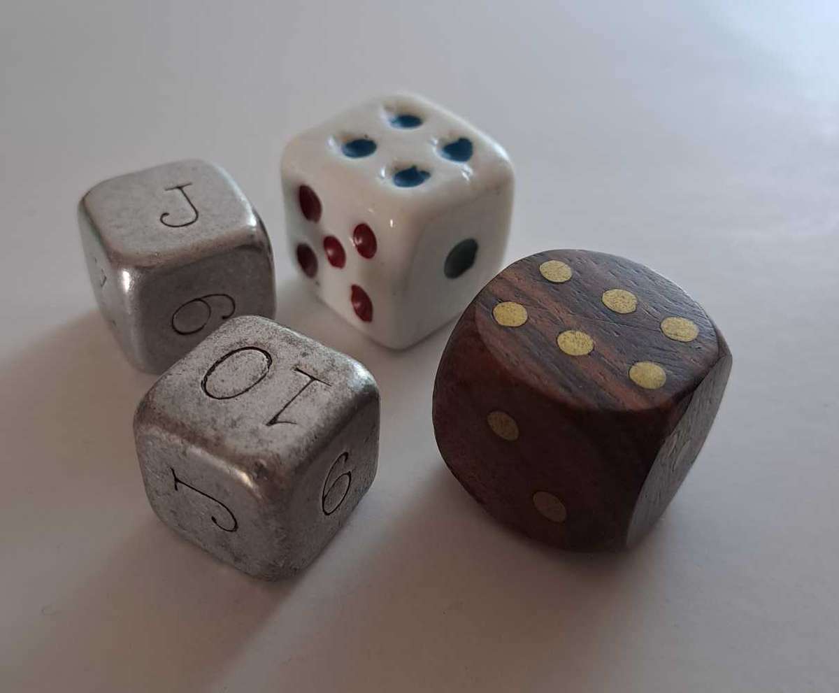 Dice collection of all colours and sizes. Some very unique pieces in wood, metal, and ceramic.