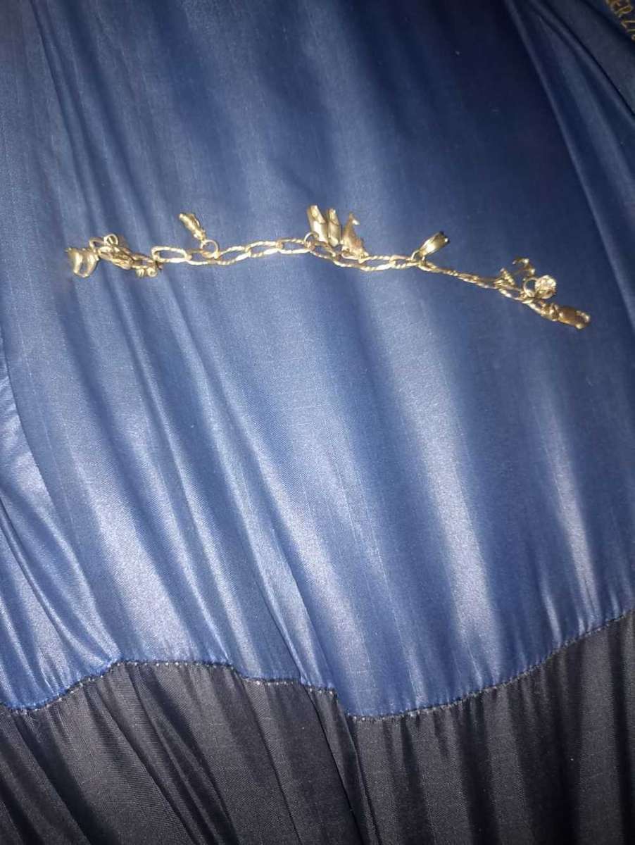 Ladies 9 carat gold charm bracelet