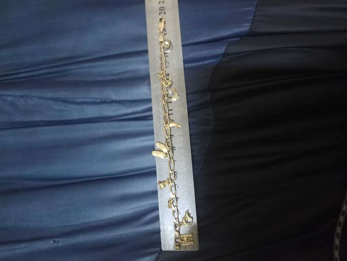 Ladies 9 carat gold charm bracelet