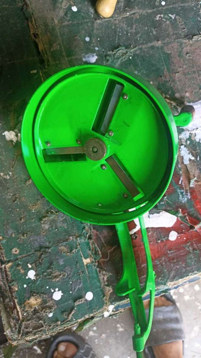 Refurbished green double been slicer