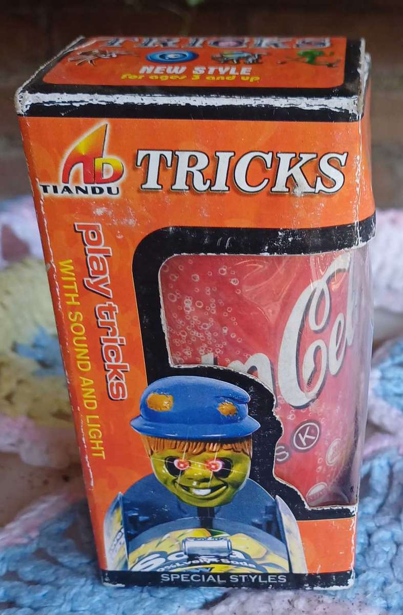 Tricky Coke tin