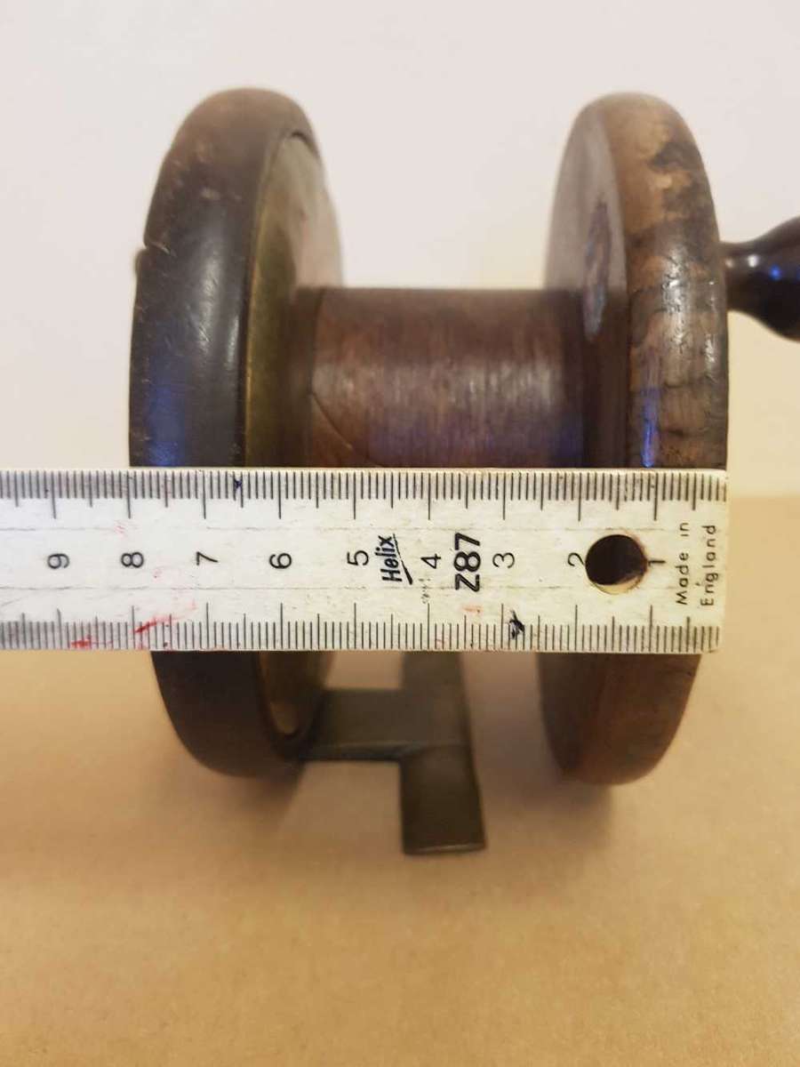 Millward frogback wooden fishing reel. Used in early 1900s
