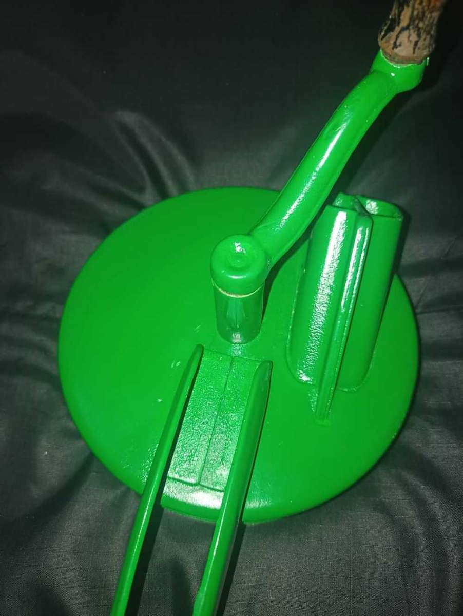 Refurbished green double been slicer