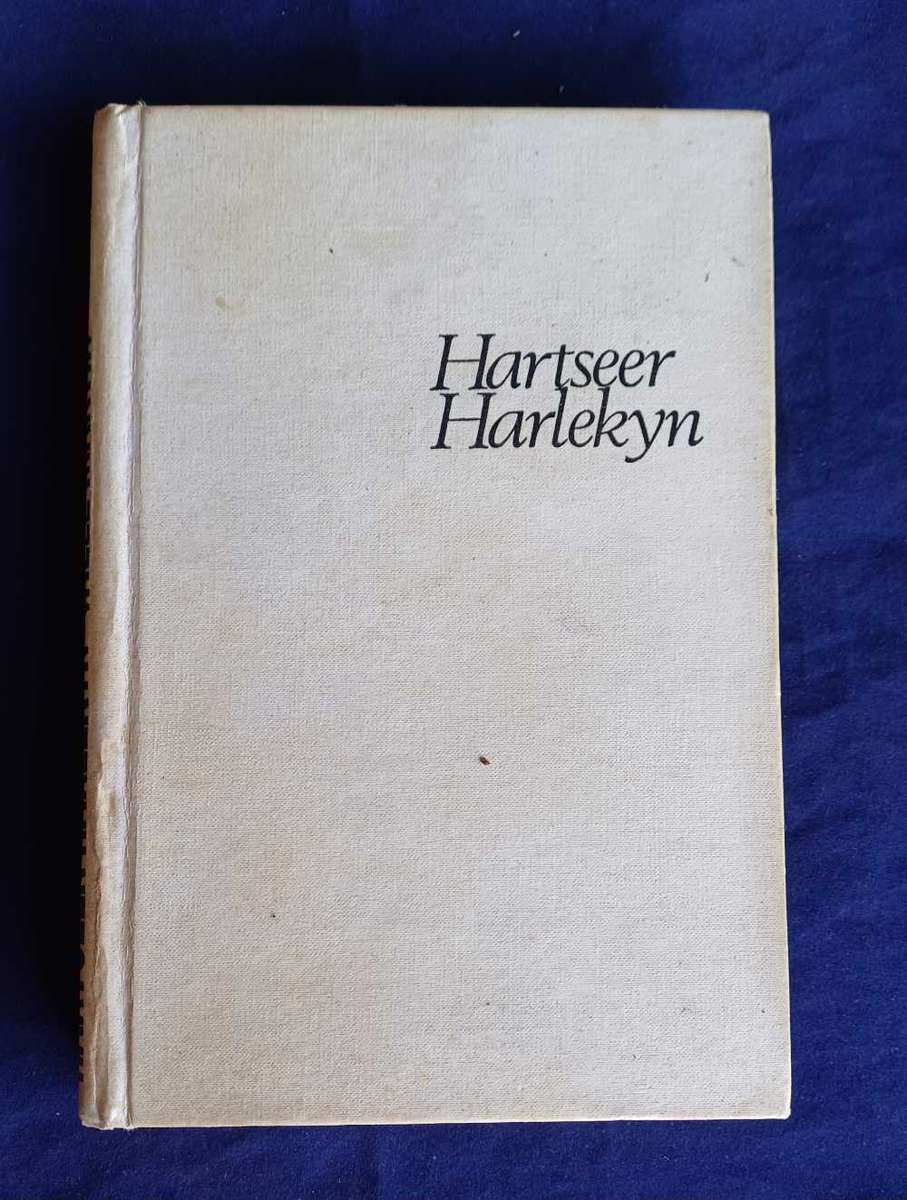 Hartseer harlekyn deur Wille Martin