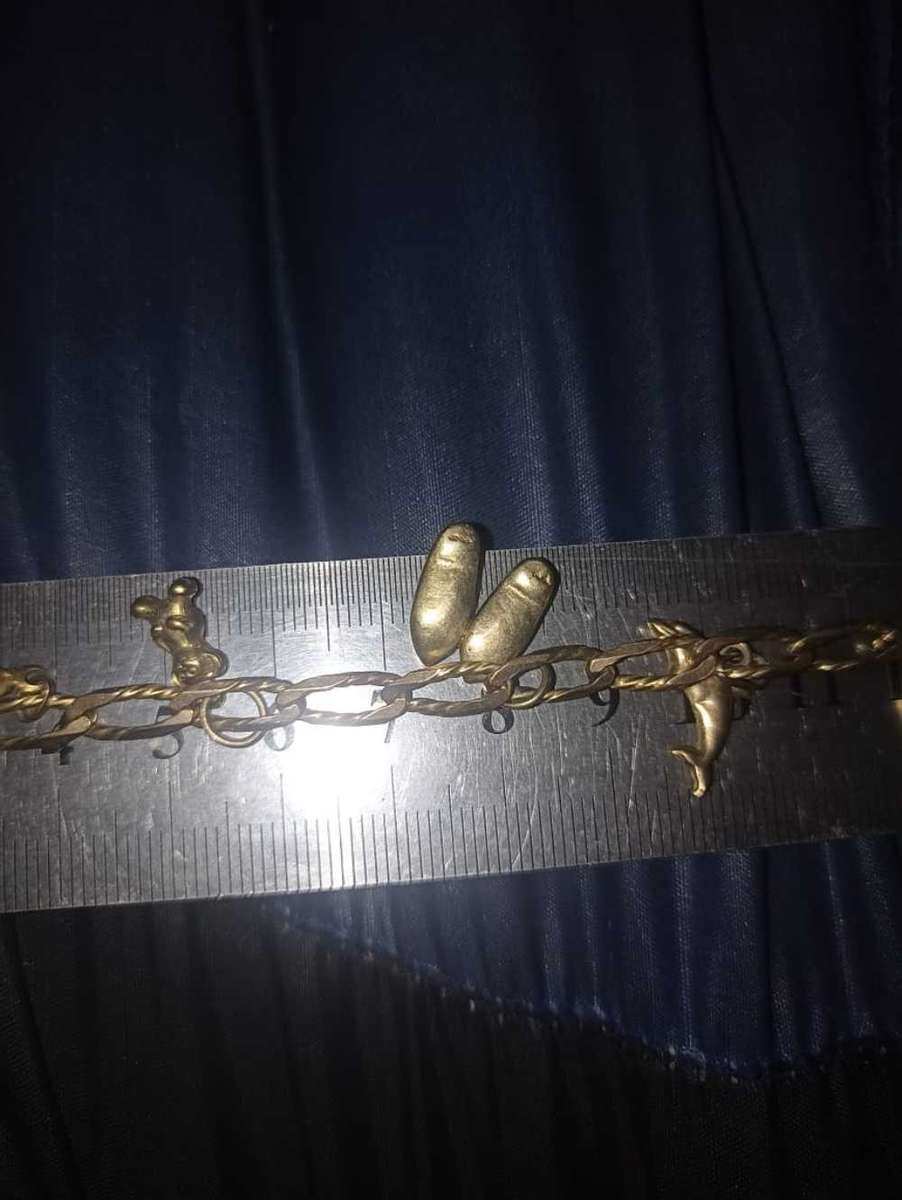 Ladies 9 carat gold charm bracelet