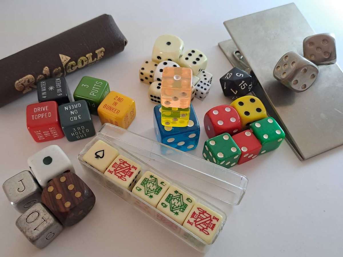 Dice collection of all colours and sizes. Some very unique pieces in wood, metal, and ceramic.