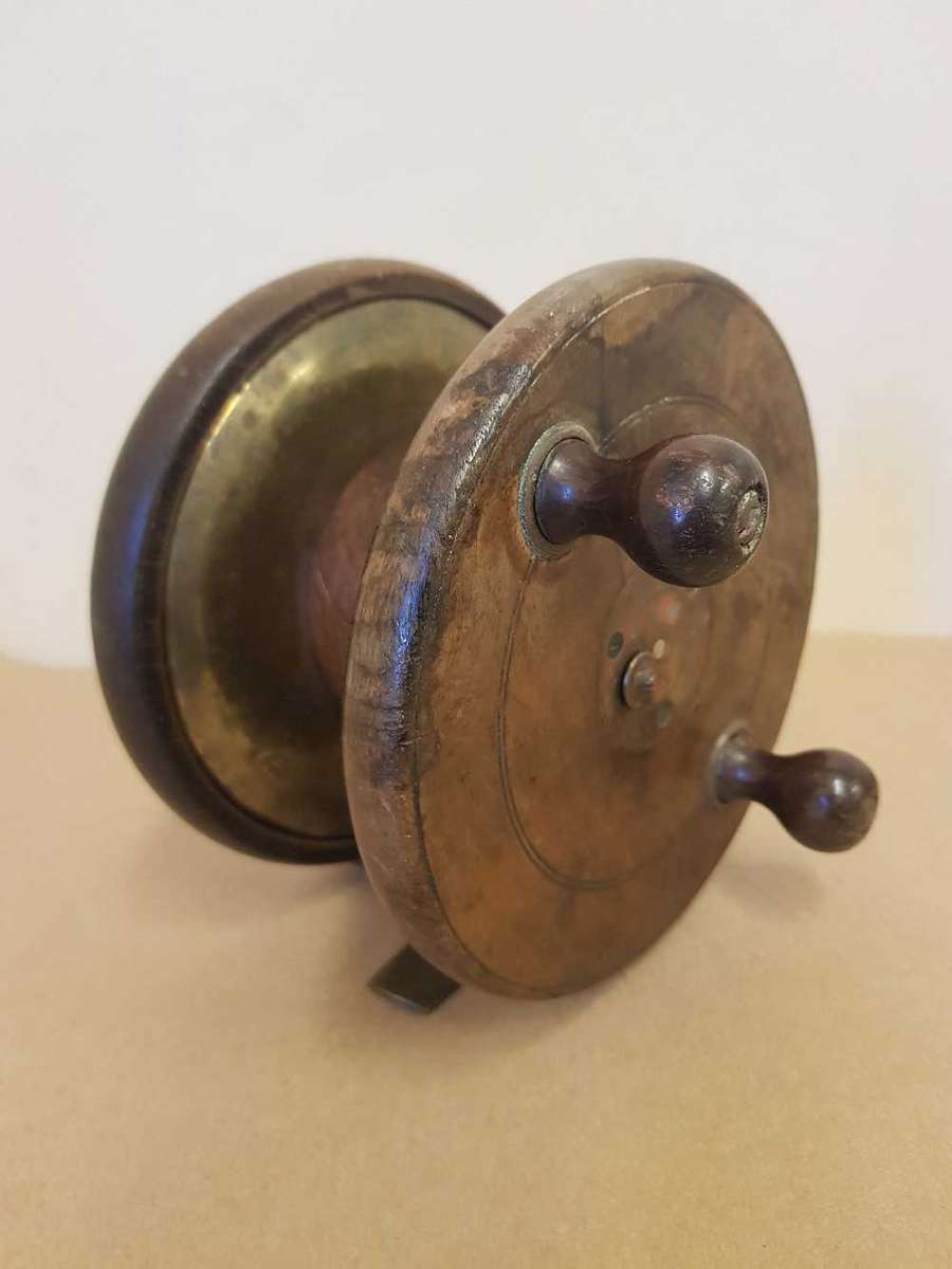 Millward frogback wooden fishing reel. Used in early 1900s
