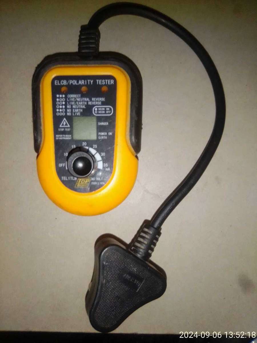 TOP TRONIC EARTH LEAKAGE TESTER.  MODEL: TEL1TLB