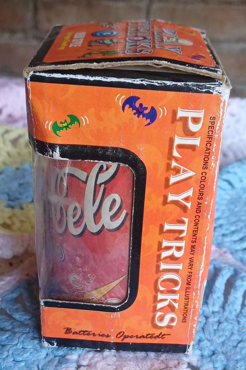 Tricky Coke tin