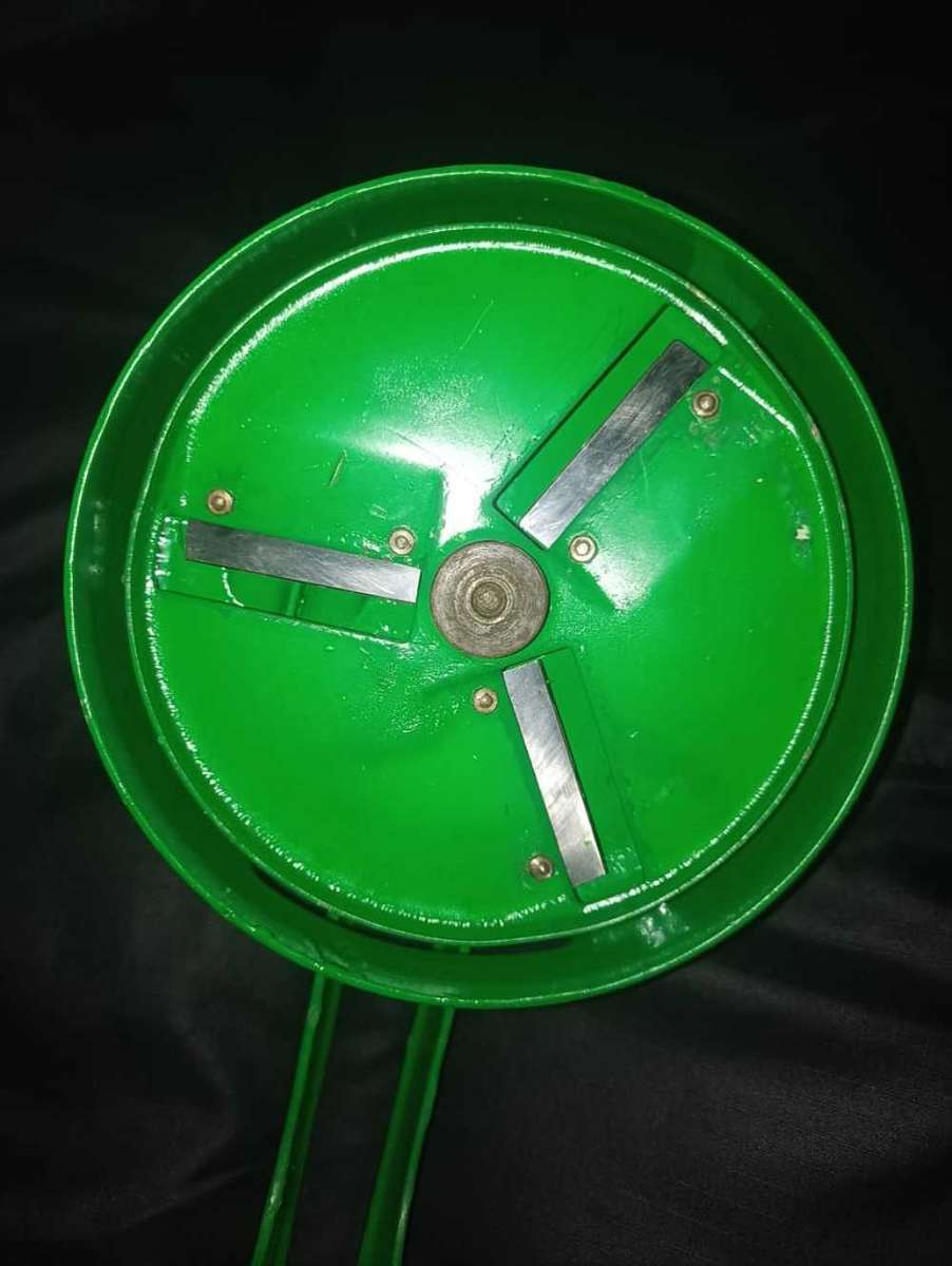 Refurbished green double been slicer