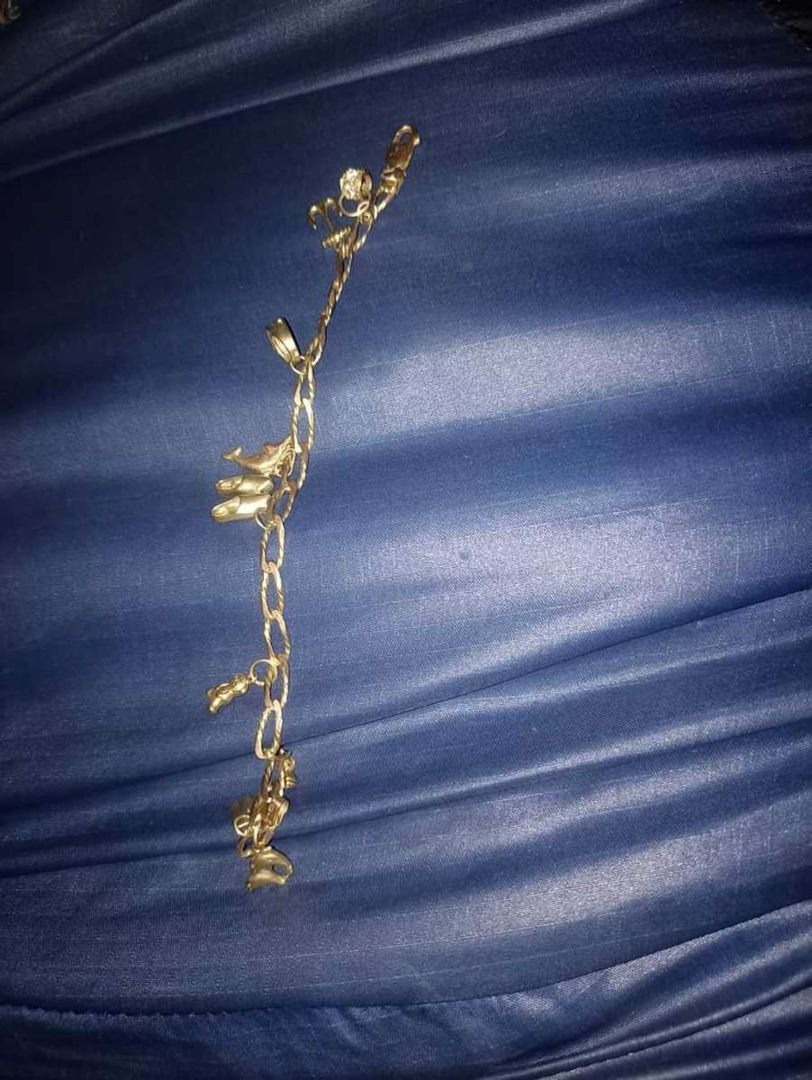 Ladies 9 carat gold charm bracelet