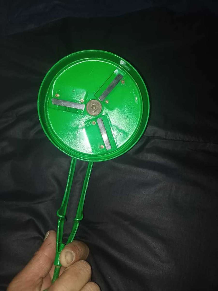 Refurbished green double been slicer