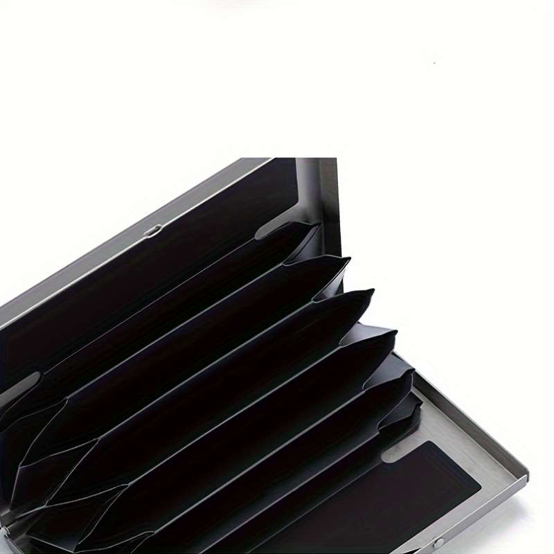 A Card Holder Wallet Made Of Thin Aluminum With A Minimalist Design Suitable