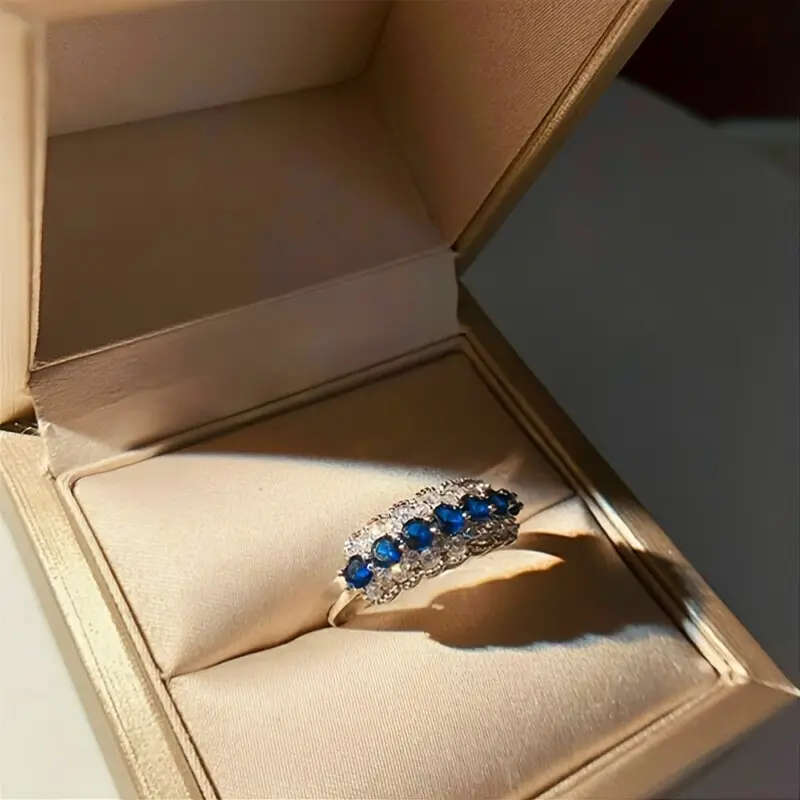 Synthetic Blue Sapphire Ring with Cubic Zirconia