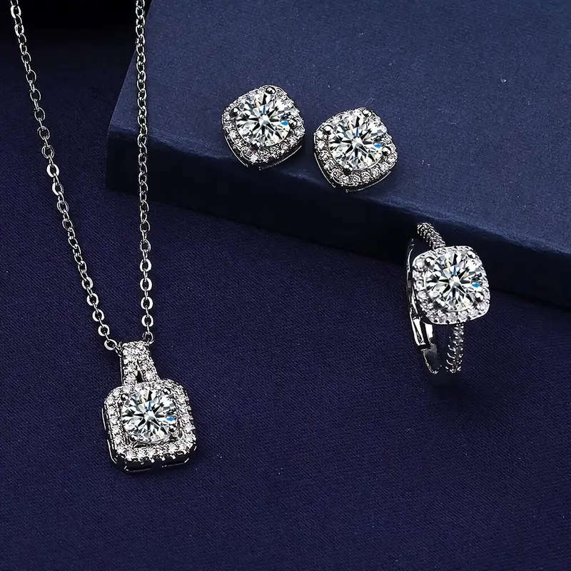 A Set Of 4 Pieces Of Necklace, Earrings, And Rings Jewelry Set