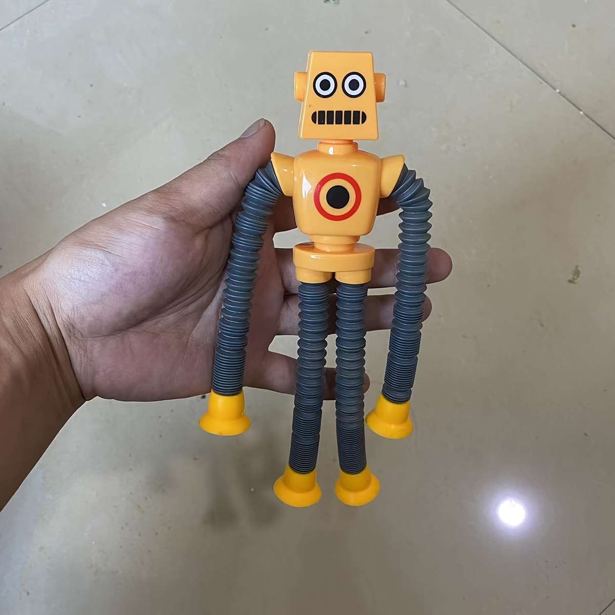 1Pc Yellow Light Up Stretching Robot Puzzle Toy