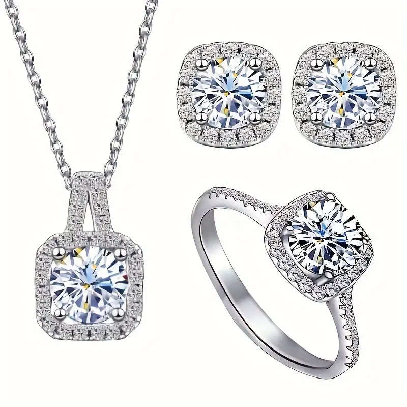 A Set Of 4 Pieces Of Necklace, Earrings, And Rings Jewelry Set
