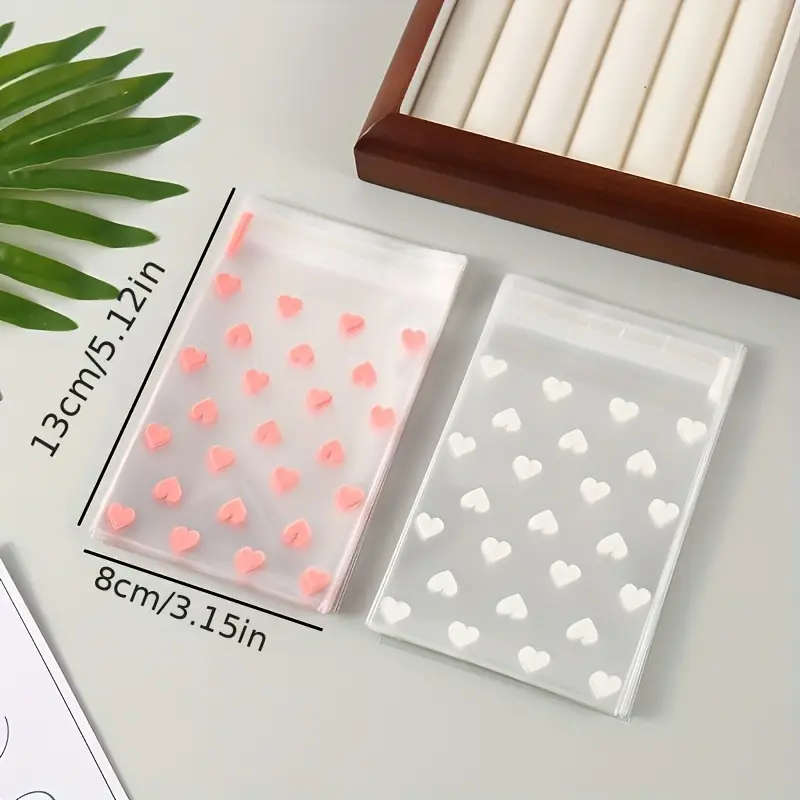 100-Pack Self-Adhesive Plastic Bags With Heart Pattern