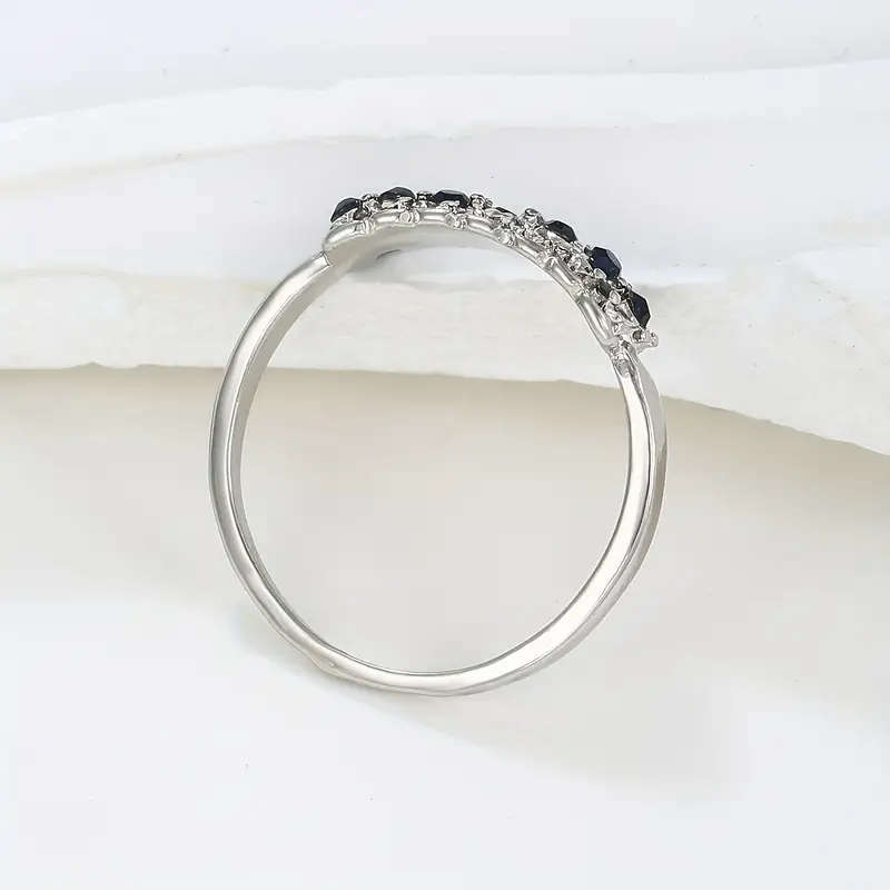 Synthetic Blue Sapphire Ring with Cubic Zirconia