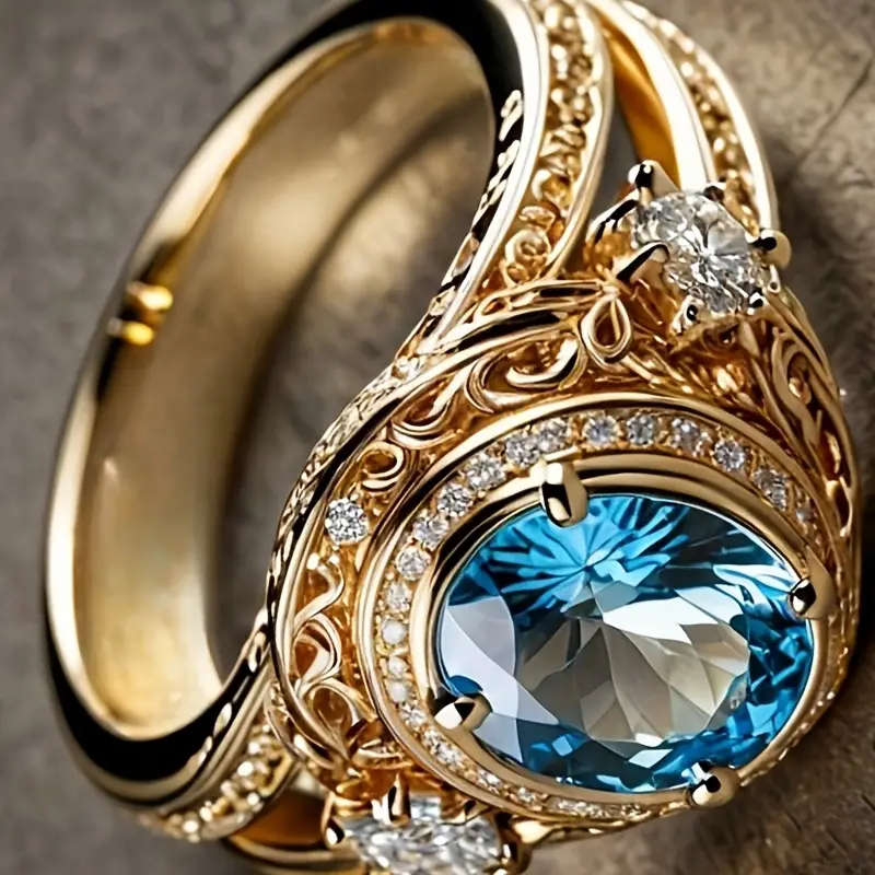 Gold Plated Copper Ring with Sparkling Blue Cubic Zirconia