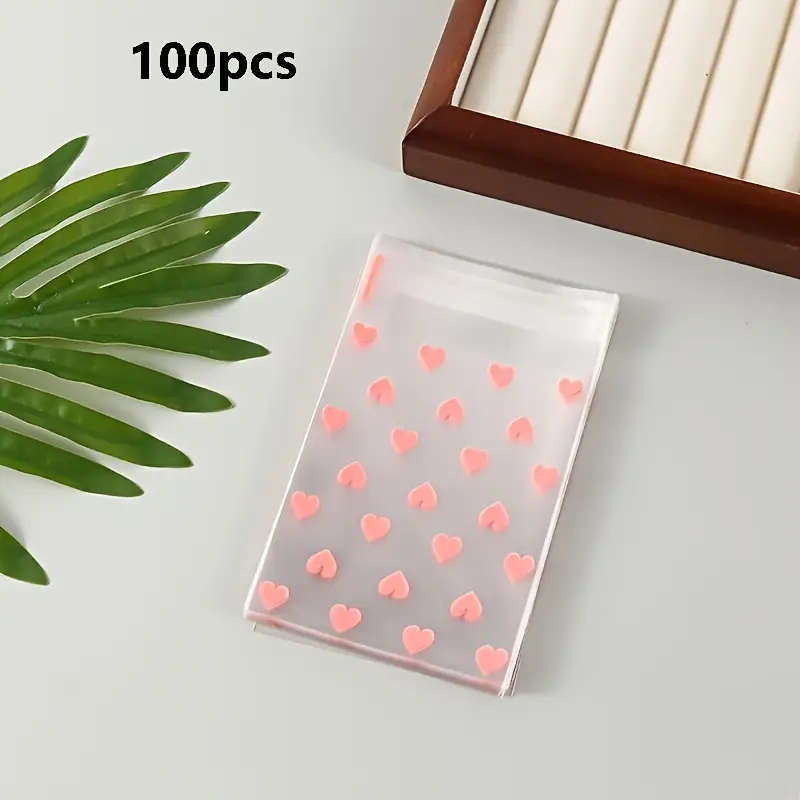 100-Pack Self-Adhesive Plastic Bags With Heart Pattern