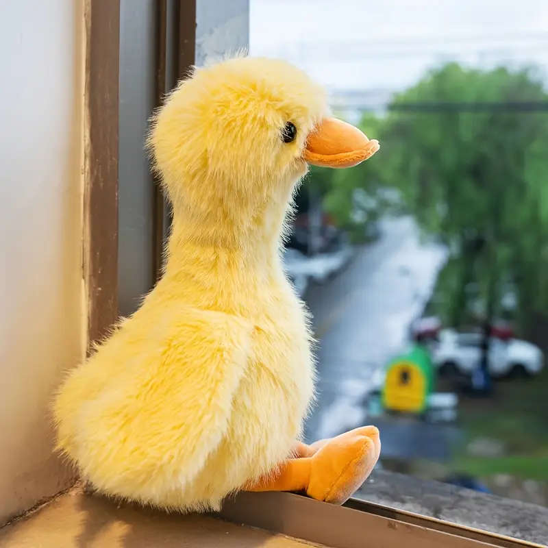 A Lifelike Yellow Plush Duck White