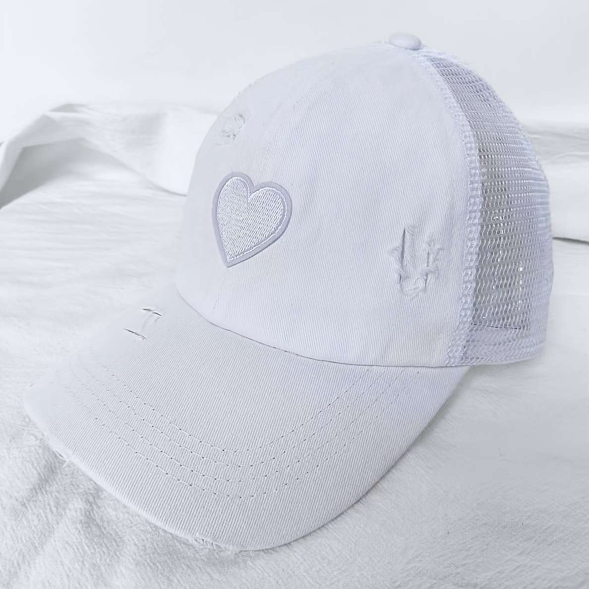 Adjustable Women's Baseball Cap with Ponytail Hole Distressed Black Mesh Trucker Hat with Hear