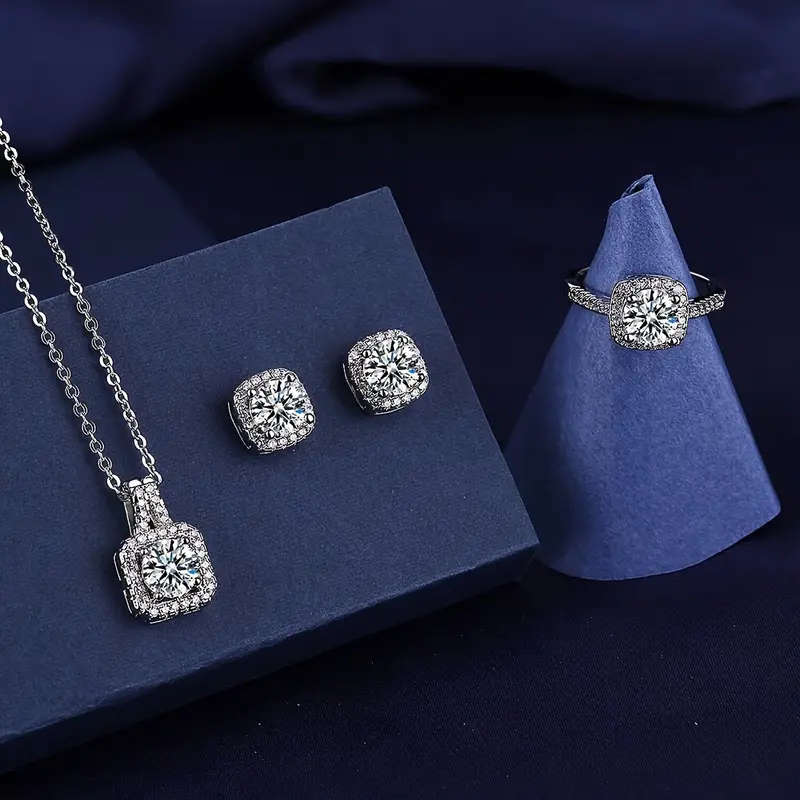 A Set Of 4 Pieces Of Necklace, Earrings, And Rings Jewelry Set