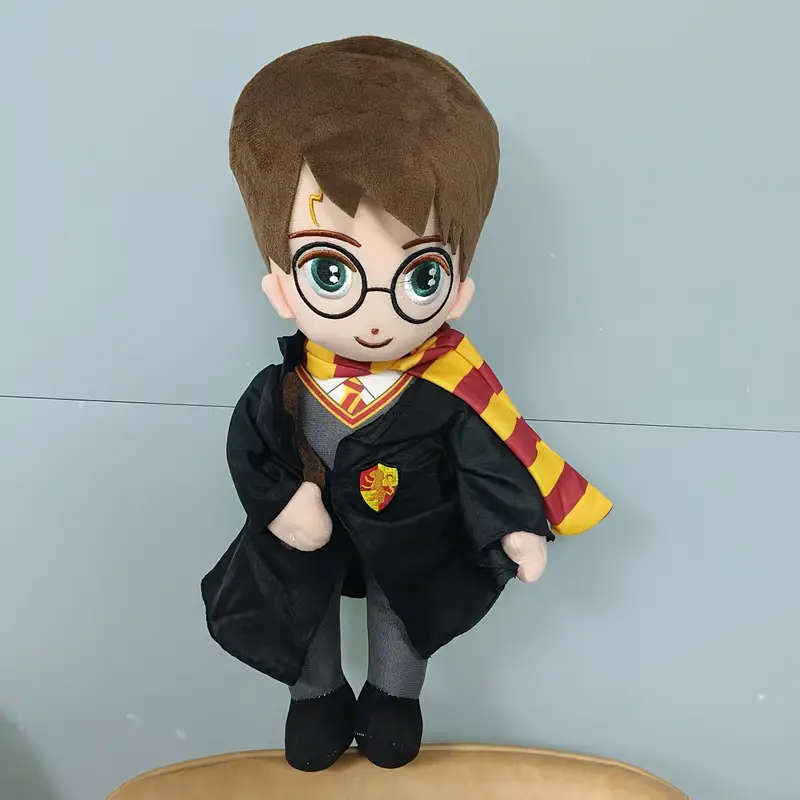 Harry Potter hugging Hedwig plush