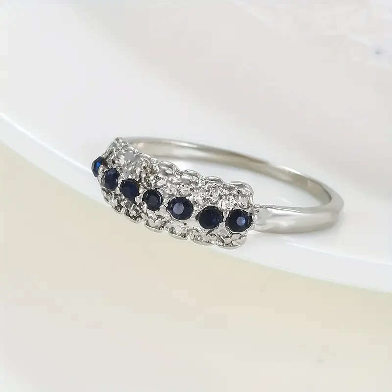 Synthetic Blue Sapphire Ring with Cubic Zirconia