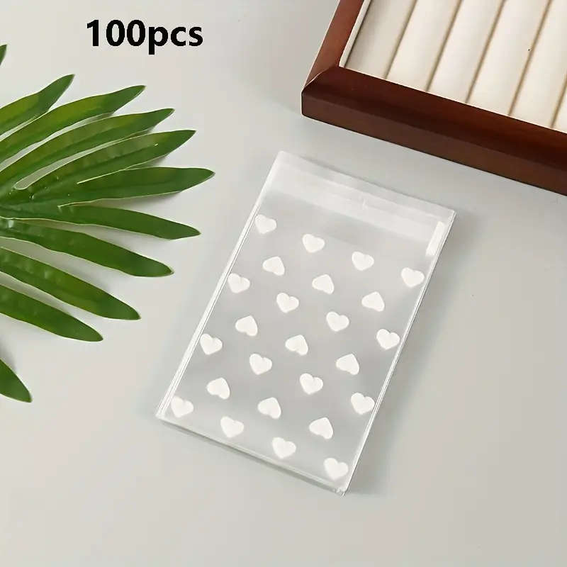 100-Pack Self-Adhesive Plastic Bags With Heart Pattern