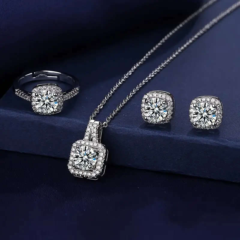 A Set Of 4 Pieces Of Necklace, Earrings, And Rings Jewelry Set