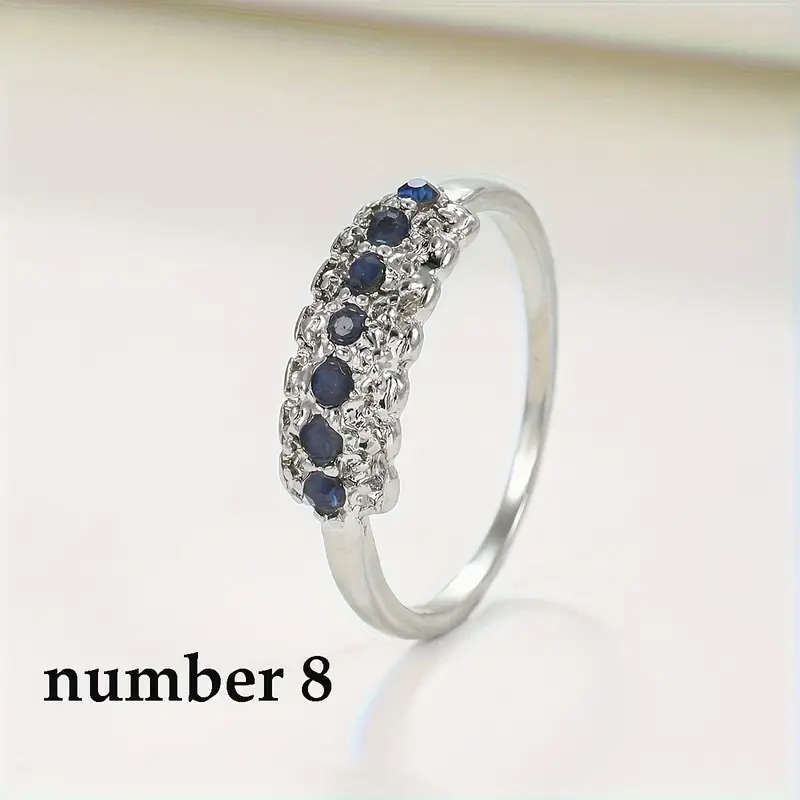 Synthetic Blue Sapphire Ring with Cubic Zirconia