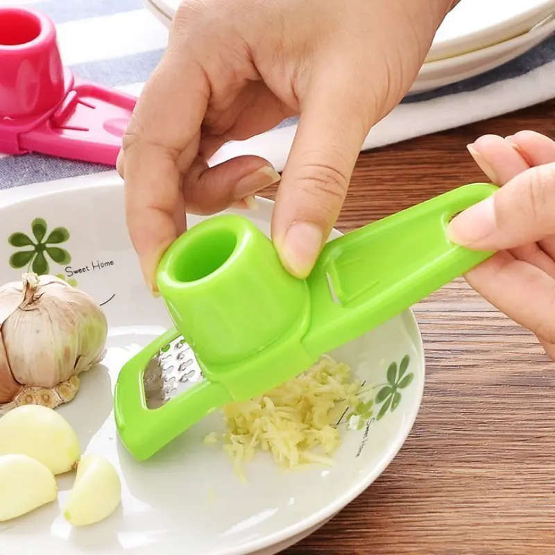 Multi-Purpose Manual Garlic Press and Grater, Plastic Garlic Mince Crusher with Ergonomic Handle