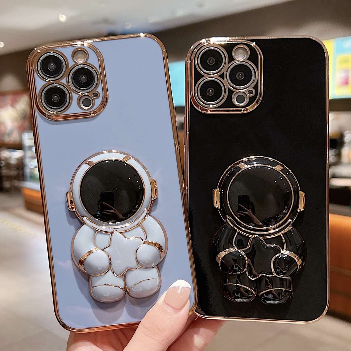 For iPhone 13 Embrace Stars Electroplating Astronaut Holder Phone Case(Blue)