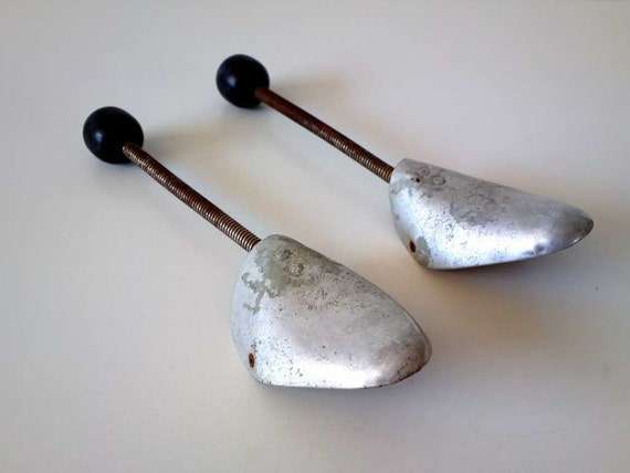 Old vintage braces for old vintage shoes, molds for shoes