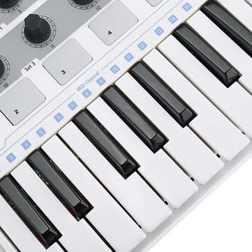 Worlde Professional 25-Key MIDI Keyboard Controller USB MIDI Drum Pad and Ultra-Portable Mini MIDI C