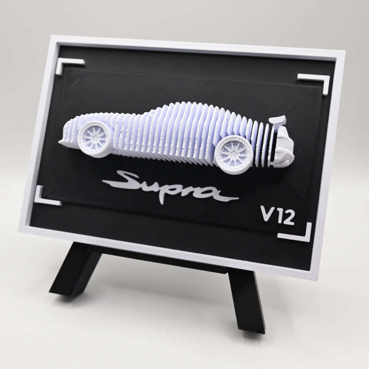 Layered Toyota Supra V12 Sculpture