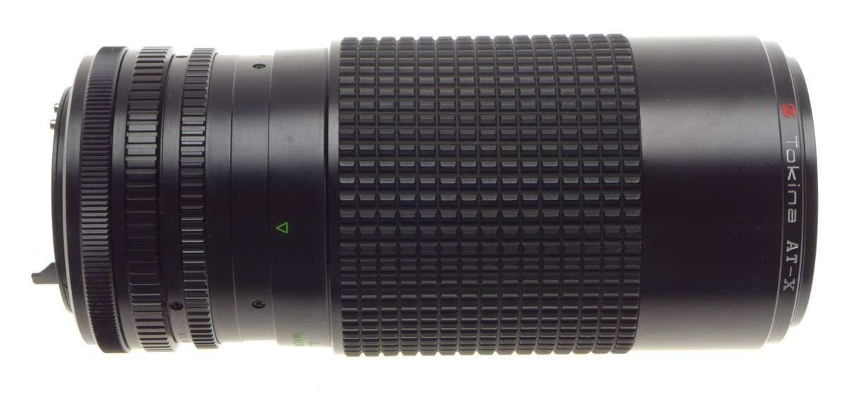 TOKINA AT-X zoom lens 50-250mm 1:4-5.6 with canon C/FD mount vintage glass - Tokina