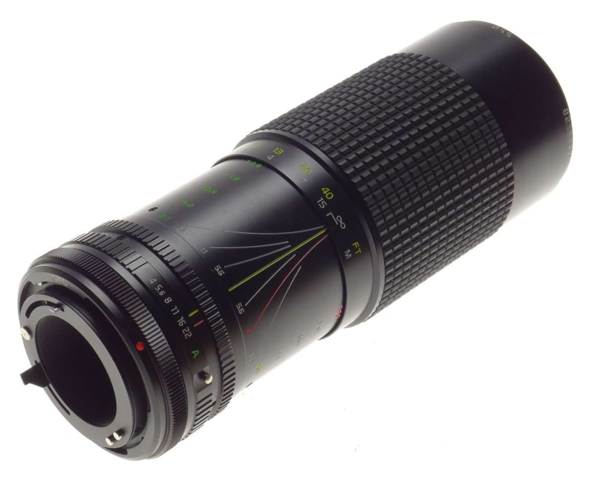 TOKINA AT-X zoom lens 50-250mm 1:4-5.6 with canon C/FD mount vintage glass - Tokina