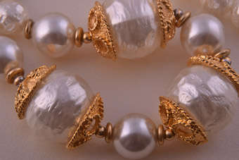 Necklace With Faux Pearls |  |