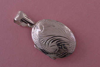 Silver Modern Locket |  |