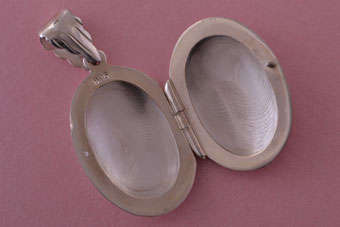 Silver Modern Locket |  |