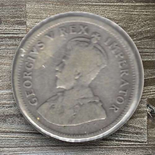 1928 *** 1 shilling *** in mylar, fine condition only