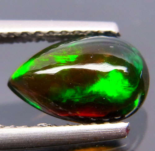 1.06ct Natural  Rainbow Fire Red Black Opal
