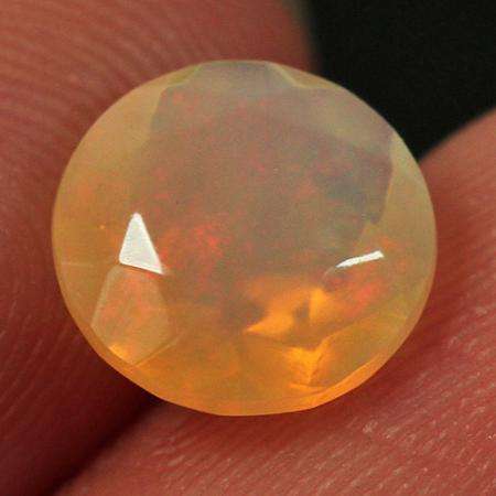 0.8 CT FACETED ETHIOPIAN OPAL - 5642
