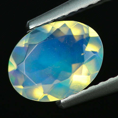 0.68 CT OVAL FACET ETHIOPIAN CRYSTA L OPAL