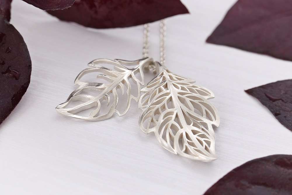 Pierced leaves pendant