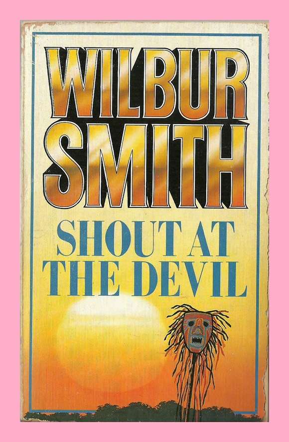 PAPERBACK - SHOUT AT THE DEVIL BY WILBUR SMITH (CONDITION VERY GOOD)